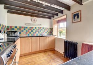 Kuchyň nebo kuchyňský kout v ubytování Lavender Cottage + 2 fotografie