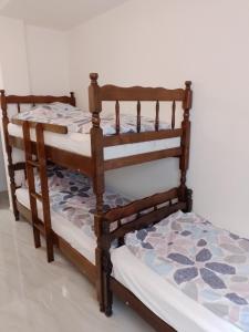 a pair of bunk beds sitting in a room at Bibi apartments in Ohrid