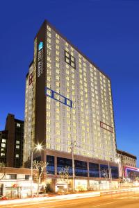 a large building with lights on the side of it at Hotel Bernoui Seoul in Seoul