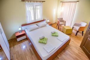 Ένα ή περισσότερα κρεβάτια σε δωμάτιο στο Majka Apartments