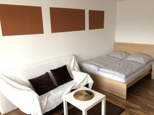 
Ein Bett oder Betten in einem Zimmer der Unterkunft Apartment Sunshine
