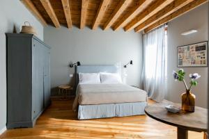 A bed or beds in a room at Casa Perazzolo