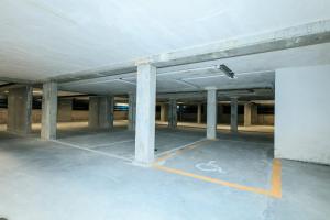 an empty parking lot in a parking garage at Residence San Francesco in Tirrenia