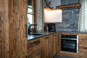 A cozinha ou kitchenette de Alpengasthof Karalm