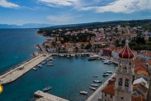 an aerial view of a harbor with boats in the water at Apartment Della Croce in Sutivan +7 photos