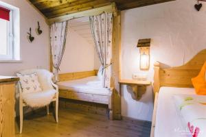 Ein Bett oder Betten in einem Zimmer der Unterkunft Haus Silberwang