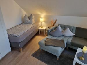 En eller flere senger på et rom på Ferienwohnung am Springerhof