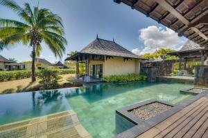an image of a swimming pool at a villa at Villa Ascocenda by Oazure in Bel Ombre