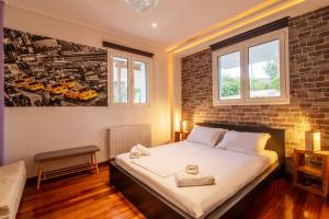 A bed or beds in a room at Spa Villa34 Family resort Renew, Relax, Revitalise