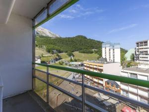 a view from the balcony of a building at Studio 4 pers, pied des pistes, balcon, kitchenette équipée, Gourette - FR-1-400-46 in Gourette