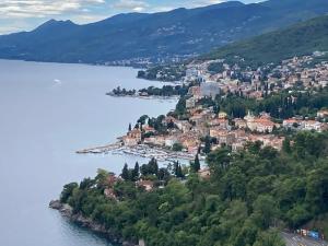 a town on the shore of a body of water at Villa Marija in Opatija