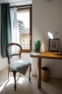 Cascina Bagaggera客房内的一张或多张床位