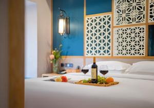 Xiangxi's Lovely - Yangyun Hotel客房内的一张或多张床位