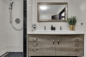 a bathroom with a sink and a mirror at Apartment Star in Makarska +40 photos