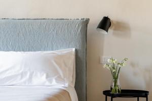 A bed or beds in a room at Casa Perazzolo