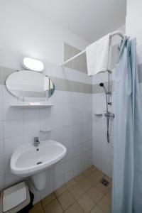 Koupelna v ubytování Campus Hotel