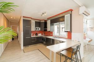 Kuchyň nebo kuchyňský kout v ubytování Casa Terra: Apartment 50 meters from the beach