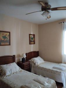 Cama o camas de una habitación en Casas Mirabel