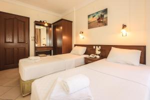 Кровать или кровати в номере Liman Apart Hotel