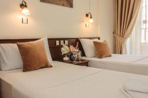 Кровать или кровати в номере Liman Apart Hotel +14 фотографий