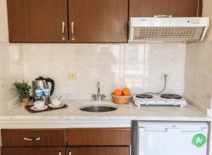 Кухня или мини-кухня в Liman Apart Hotel
