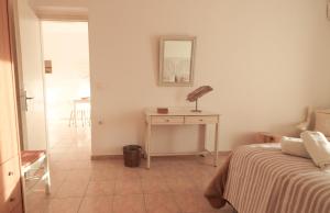 Posteľ alebo postele v izbe v ubytovaní Comfortable Apartment with Garden - Casa con Vista
