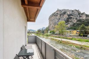 a balcony with a view of a mountain at Casa Flavia, Mountains & River in Arco