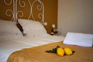 A bed or beds in a room at Audaces Resort