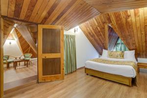 Summit Le Royale Hotel, Shimla客房内的一张或多张床位