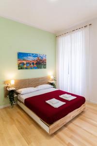 Postel nebo postele na pokoji v ubytování Residenza Leoncino