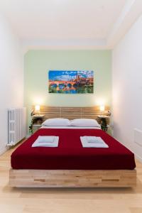 Postel nebo postele na pokoji v ubytování Residenza Leoncino