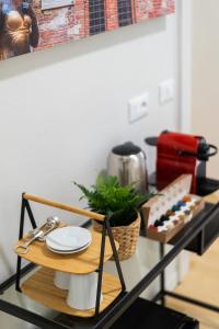Příslušenství pro přípravu čaje a kávy v ubytování Residenza Leoncino