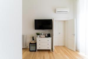 TV a/nebo společenská místnost v ubytování Residenza Leoncino