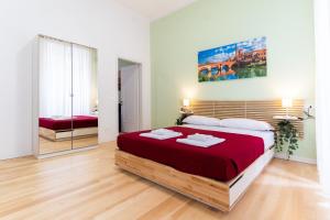 Postel nebo postele na pokoji v ubytování Residenza Leoncino