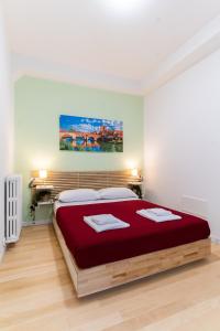 Postel nebo postele na pokoji v ubytování Residenza Leoncino