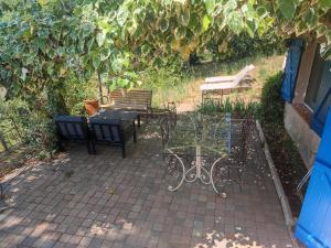 Zahrada ubytování Appartement en pleine nature avec piscine chauffée