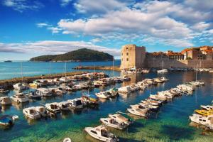 a bunch of boats in the water in a harbor at Luma Studio in Dubrovnik