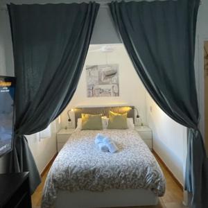 Posteľ alebo postele v izbe v ubytovaní APARTAMENTO VACACIONAL