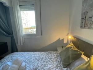 Posteľ alebo postele v izbe v ubytovaní APARTAMENTO VACACIONAL