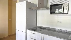 Kuchyňa alebo kuchynka v ubytovaní Apartamentos Satse Moncofa