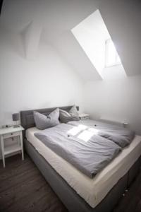 Postel nebo postele na pokoji v ubytování Villa Nordlicht