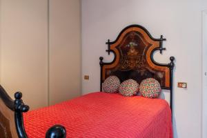 En eller flere senger på et rom på Destinazione Paradiso