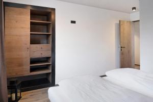 Letto o letti in una camera di Angerle Alm Apt König Laurin