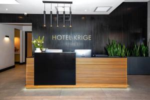 De lobby of receptie bij Hotel Krige