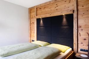 Angerle Alm Apt Similde B客房内的一张或多张床位