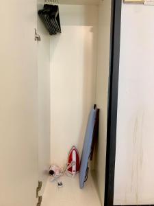 a room with a wall with a baseball bat at AmicaHomes Studio 3 Empire City Free wifi & Netflix in Petaling Jaya