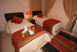 Voodi või voodid majutusasutuse A three-bedroom villa with a private pool and landscaped garden Wi-Fi toas