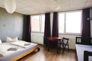Postel nebo postele na pokoji v ubytování Sleep Station Hostel