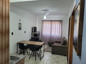TV a/nebo společenská místnost v ubytování Apartamento Aconchego Azul Pomerode
