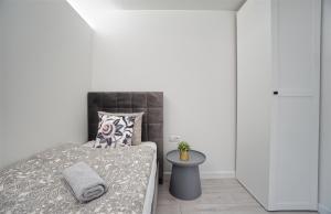 Posteľ alebo postele v izbe v ubytovaní Warsaw Premium Apartments Old Town